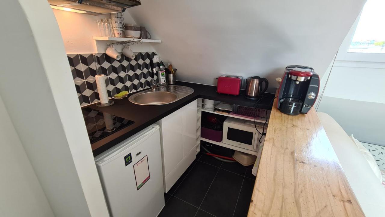 Appartement Coeur De Paris Avec Vue Sur Les Toits المظهر الخارجي الصورة